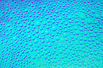 Aesthetic waterdrops on blue and purple Rainbow gradient background. Holographic soft pastel colors backdrop. Trendy creative gradient. Colorful rainbow gradient poster, banner wallpaper.