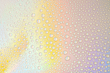 Blurred defocused abstract iridescent foil wallpaper texture. Holographic soft pastel colors backdrop. Colorful rainbow gradient poster, banner background. Minimal liquid owerflow, unicorn aesthetic.