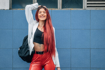 trendy redhead urban girl on the street