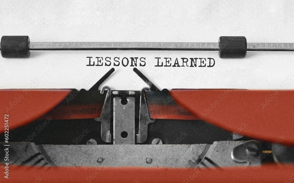 Poster text lessons learned typed on retro typewriter