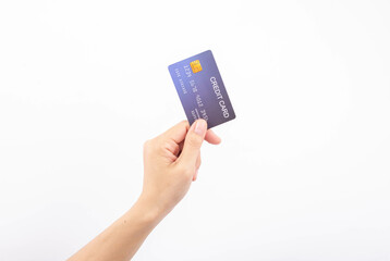 Female hand holding blue credit card on white background