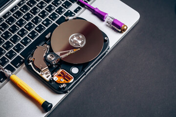 Computer disassembled HDD hard drive data disc SSD, backup part of the PC or laptop. Recovery,...