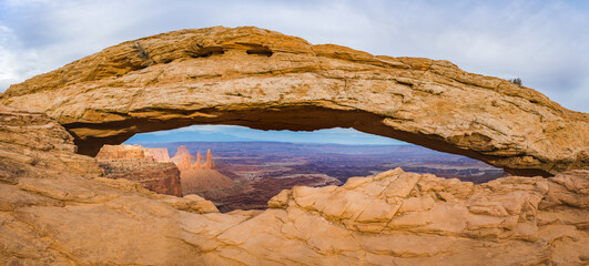panorama view during sunset at mesa arch at canyonlands national park utah