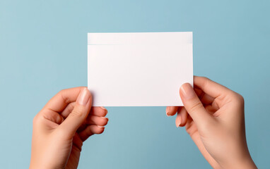 Fototapeta premium Mockup message card with female hand fingers. Concept suitable for online shop advertising, mockup corporate and freelance marketing and promotion and business.