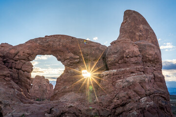 sun rays at turret arch at arches national park in utah usa © DEN