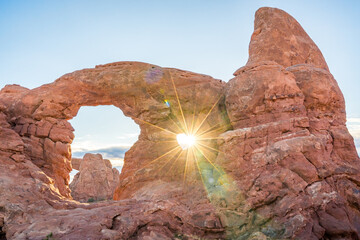 bight sun rays shining through turret arch at arches national park in utah usa © DEN