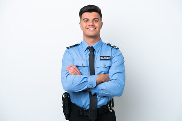 Young police caucasian man isolated on white background keeping the arms crossed in frontal position