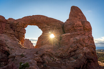 sunrise at turret arch at arches national park in utah usa © DEN