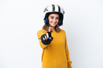 Young caucasian woman with a motorcycle helmet isolated on white background showing and lifting a finger