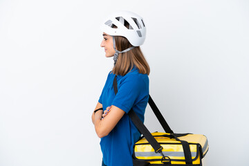 Young caucasian woman with thermal backpack isolated on white background in lateral position