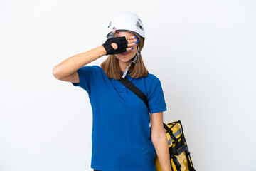 Young caucasian woman with thermal backpack isolated on white background covering eyes by hands. Do not want to see something