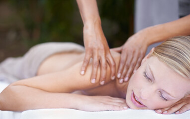 Hands of masseuse, woman getting massage in spa and wellness with peace, tranquility and holistic treatment. Stress relief, zen and female person at luxury resort with self care and body healing