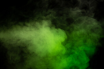 Obraz na płótnie Canvas Green and white steam on a black background.