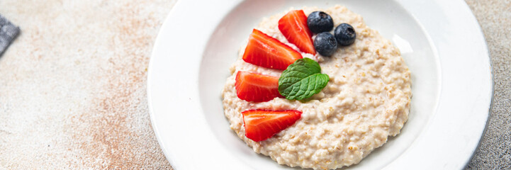 oatmeal porridge breakfast berries healthy meal food snack on the table copy space food background rustic top view