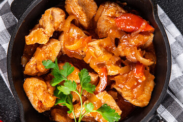 chicken meat spicy tomato sauce meal food snack on the table copy space food background rustic top view