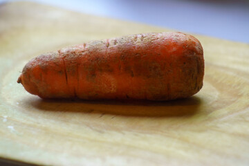 Carrots on a cutting board before preparing a salad