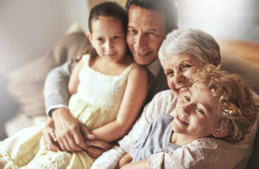 Fototapeta na wymiar Smile, relax or happy grandparents with a children hug to embrace love together in family home in retirement. Elderly grandma, old man or kids relaxing, bonding or enjoying quality time together