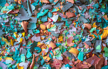 Multicolored texture created with pieces of dry tempera with pastel colors ideal for backgrounds...