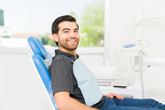 Happy Male Patient With A Big Smile At The Dentist