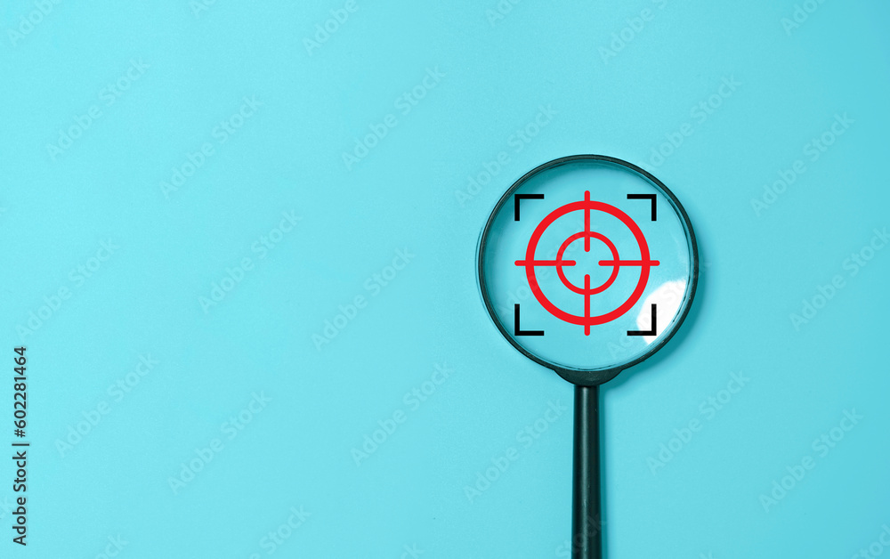 Poster focus icon inside of magnifier glass for concentrate business in objective target on blue background