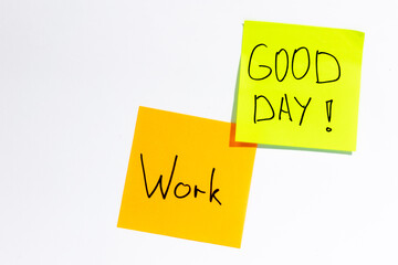 Colored paper reminders on white background, office work concept.