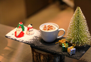 Cup of beautiful and luxury drink and sweet on black rock tray.