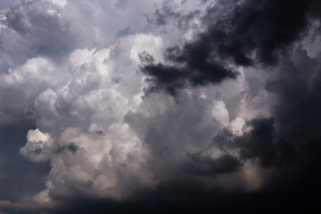 Fototapeta premium Epic Storm sky, dark grey, black and white rain cumulus clouds background texture, thunderstorm, heaven 