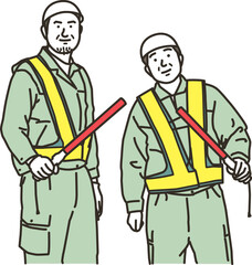 現場で警備をする作業員の男性
