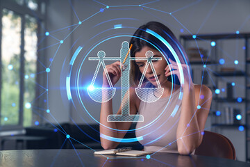 Smiling businesswoman in casual wear holding using smartphone typing at office workplace with...