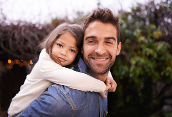 Happy, piggyback and hug with father and daughter in nature for bonding, family love and affectionate. Smile, relax and happiness with man carrying young child in park for support, weekend and care