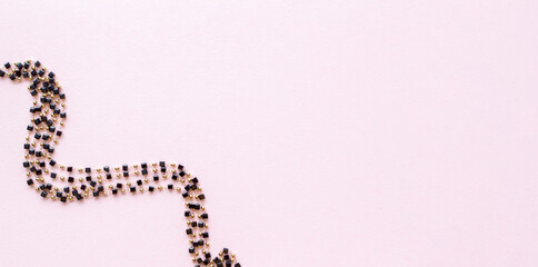 Background for needlework and jewelry, DIY. chain with beads. Blur effect. Weak focus.