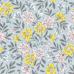 Retro floral pattern in small flowers. Small yellow and white flowers. Light blue background. Ditsy print. Floral seamless background. The elegant the template for fashion prints. Stock pattern.
