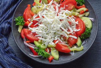 Balkan cuisine. Shopska Salad, traditional dish of the Balkan. It is made from vegetables and cheese