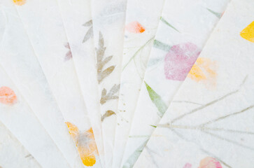 Stack of the different Dried Flowers Handmade Recycled Paper.