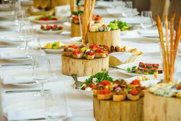 Cheese, sandwiches, bread and aperitifs in a restaurant