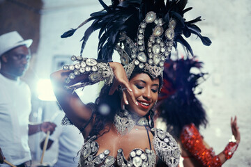 Festival, carnival and dancer woman in samba with smile, music and party celebration in Brazil....