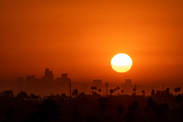 9/7/2022:   A hot summer sun rises over Los Angeles during the end of summer heatwave that caused...