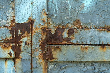 Rusty metal texture with peeling paint