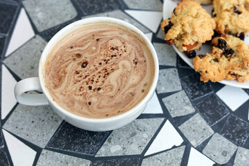 cup of coffee and cookies
