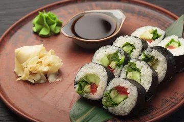 Fotobehang Large set of sushi with soy sauce and wasabi © Alernon77