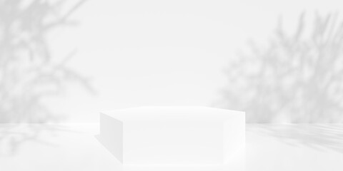 Empty, blank, hexagon shaped podium or dais in white room background with tree shadows on the back wall, product or design placement template