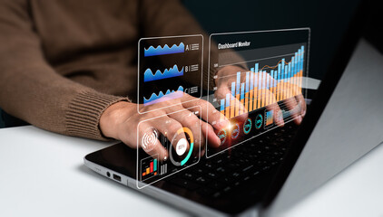 A businessman assesses the marketing, financial organization, and data management strategies used in his sector.Charts, measurements, and KPIs are used in business analytics to enhance organizational.