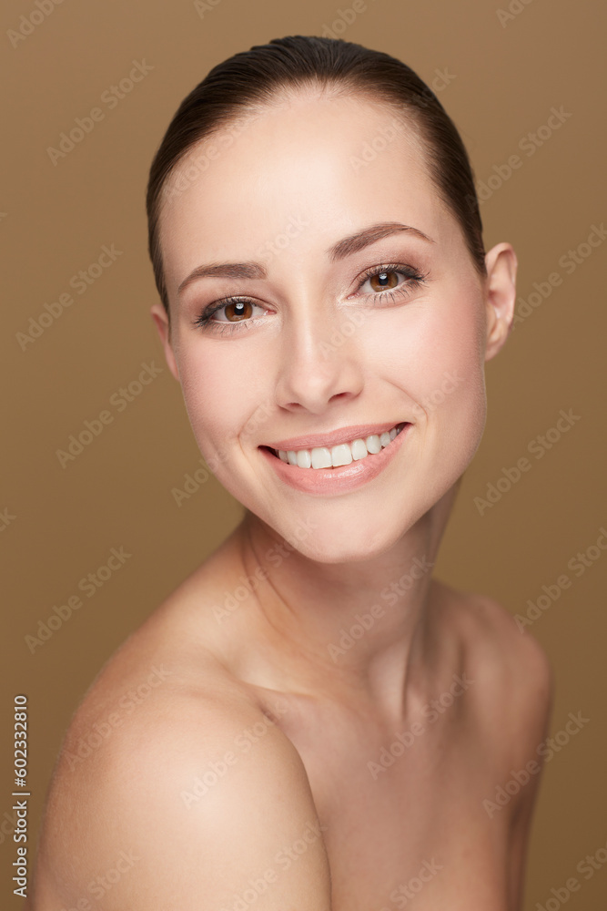 Wall mural Portrait, smile and woman with dermatology, cosmetics and beauty against a brown studio background. Face, female person and model with skincare, salon treatment and luxury with wellness and self care