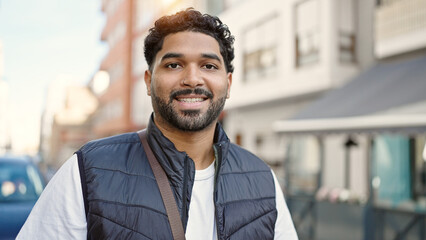 Fototapeta premium African american man smiling confident standing at street