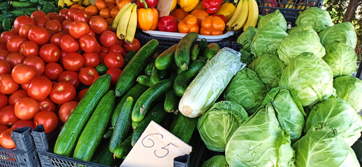 Close-up view of fresh organic ripe vegetables and fruits, displayed for sale in farmer markets. Agricultural business. Organic harvest. Agriculture. Eco farming. Sustainable resources and lifestyles