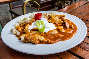 Authentic Hungarian dish - Perkelt with Galuska dumplings