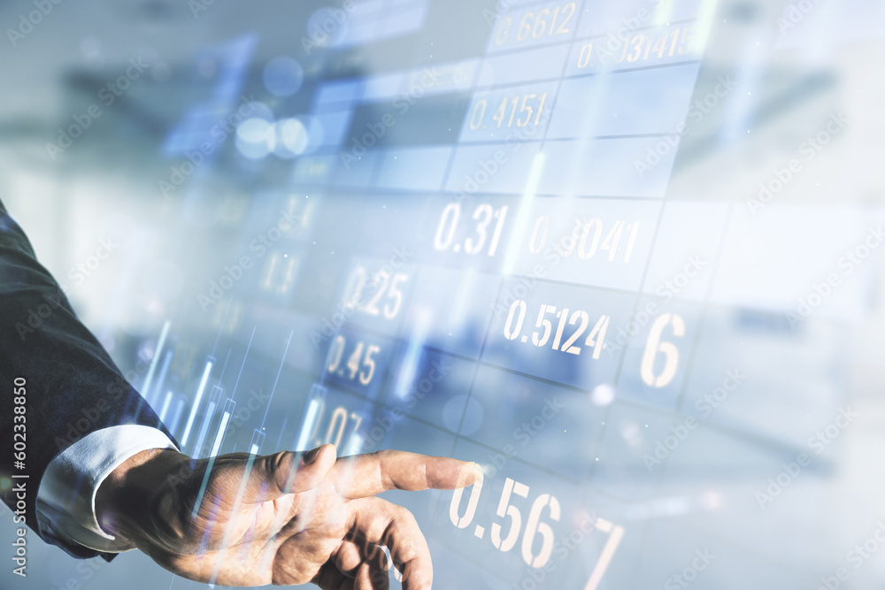 Poster multi exposure of trader hand clicks on virtual abstract financial graph interface on blurred office