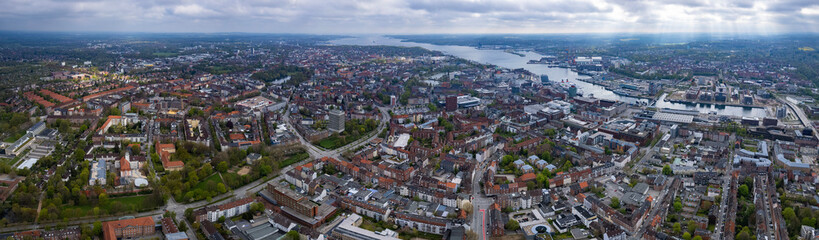 Aerial around the old town of the city Kiel on a sunny spring day