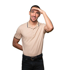 Fototapeta premium Happy young man with a gesture of looking away