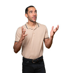 Fototapeta premium Happy young man looking up gesture